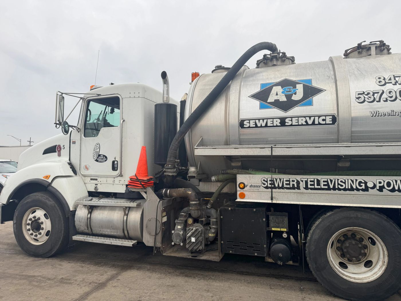 A&J Sewer Service truck on the job